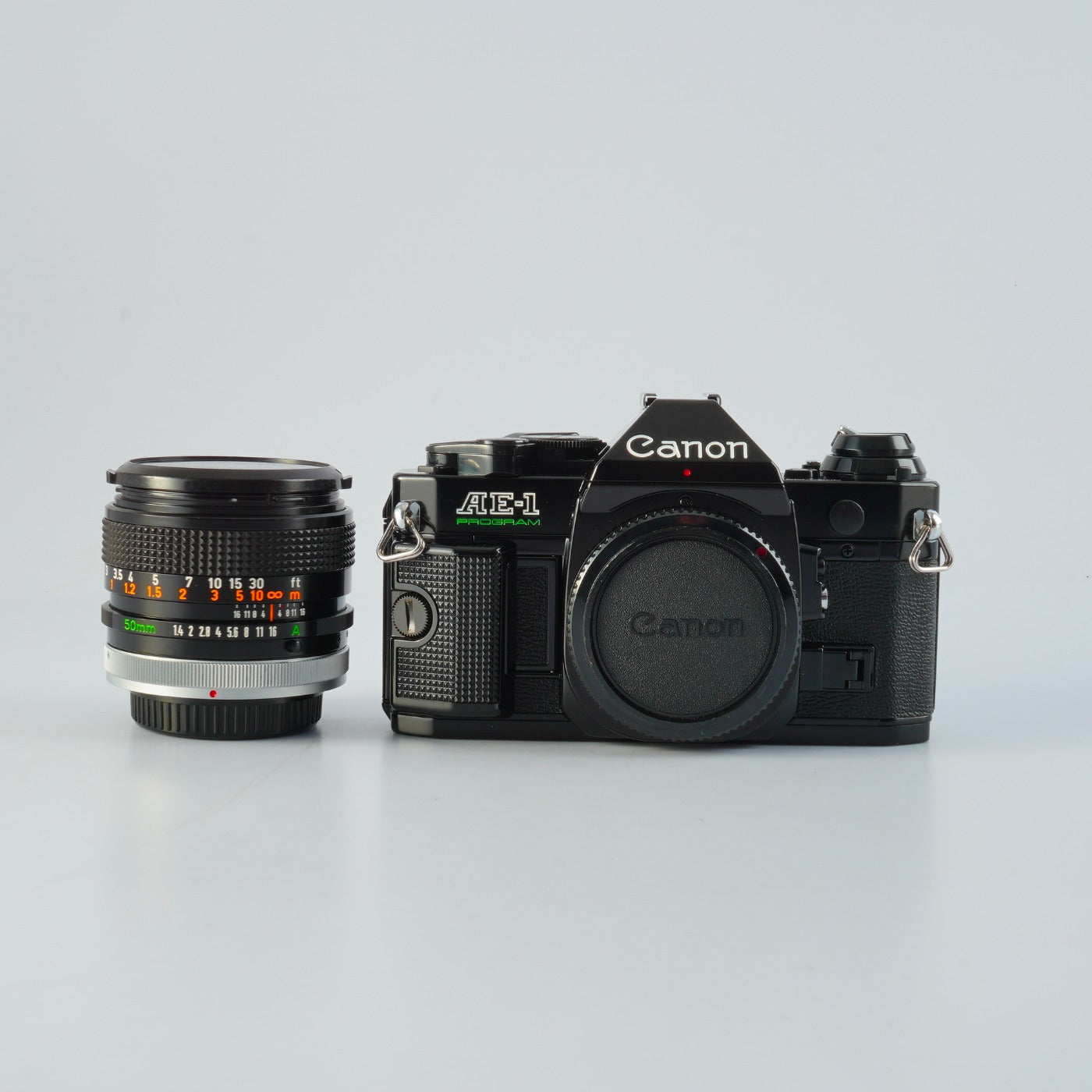 【SERVICED & TESTED】 Canon AE-1 Program Black + FD 50mm F/1.4 S.S.C. MF フィルム一眼レフカメラ