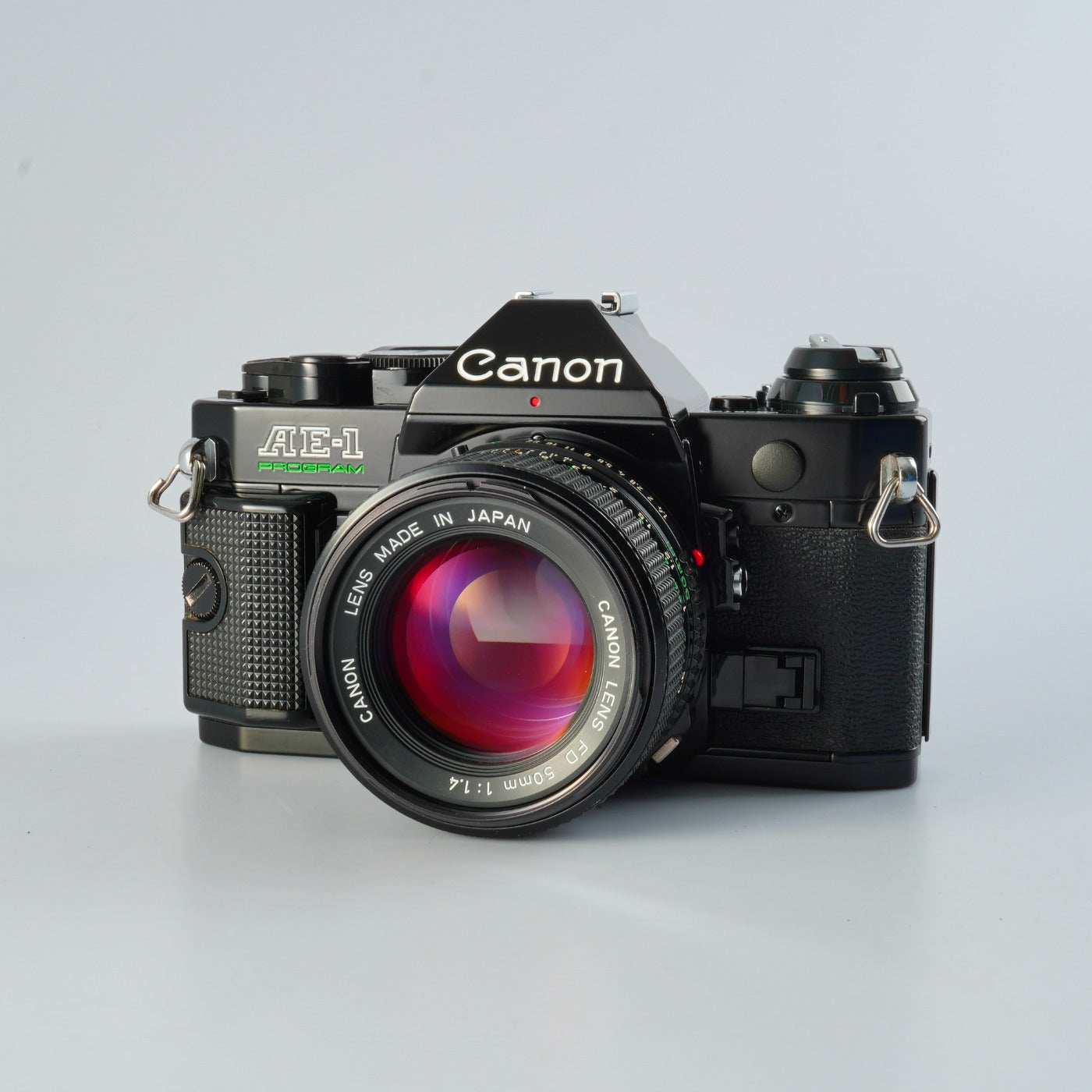 [SERVICED &amp; TESTED] Canon AE-1 Program Black + New FD 50mm F/1.4 MF Film SLR Camera