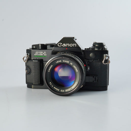 【CLA’d】 Canon AE-1 Program Black + New FD 50mm F/1.4 MF フィルム一眼レフカメラ