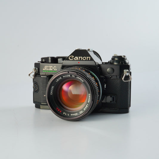 【SERVICED & TESTED】 Canon AE-1 Program Black + FD 50mm F/1.4 S.S.C. "O" MF フィルム一眼レフカメラ