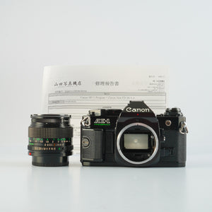 【SERVICED】 Canon AE-1 Program Black + New FD 50mm F/1.4 MF フィルム一眼レフカメラ