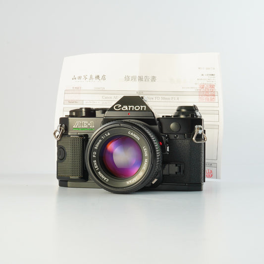 【Serviced】 Canon AE-1 Program Black + New FD 50mm F/1.4 MF フィルム一眼レフカメラ