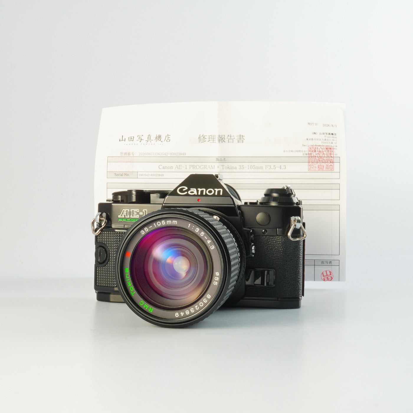 【Serviced】 Canon AE-1 Program Black + RMC Tokina 35-105mm F/3.5-4.3 MF フィルム一眼レフカメラ