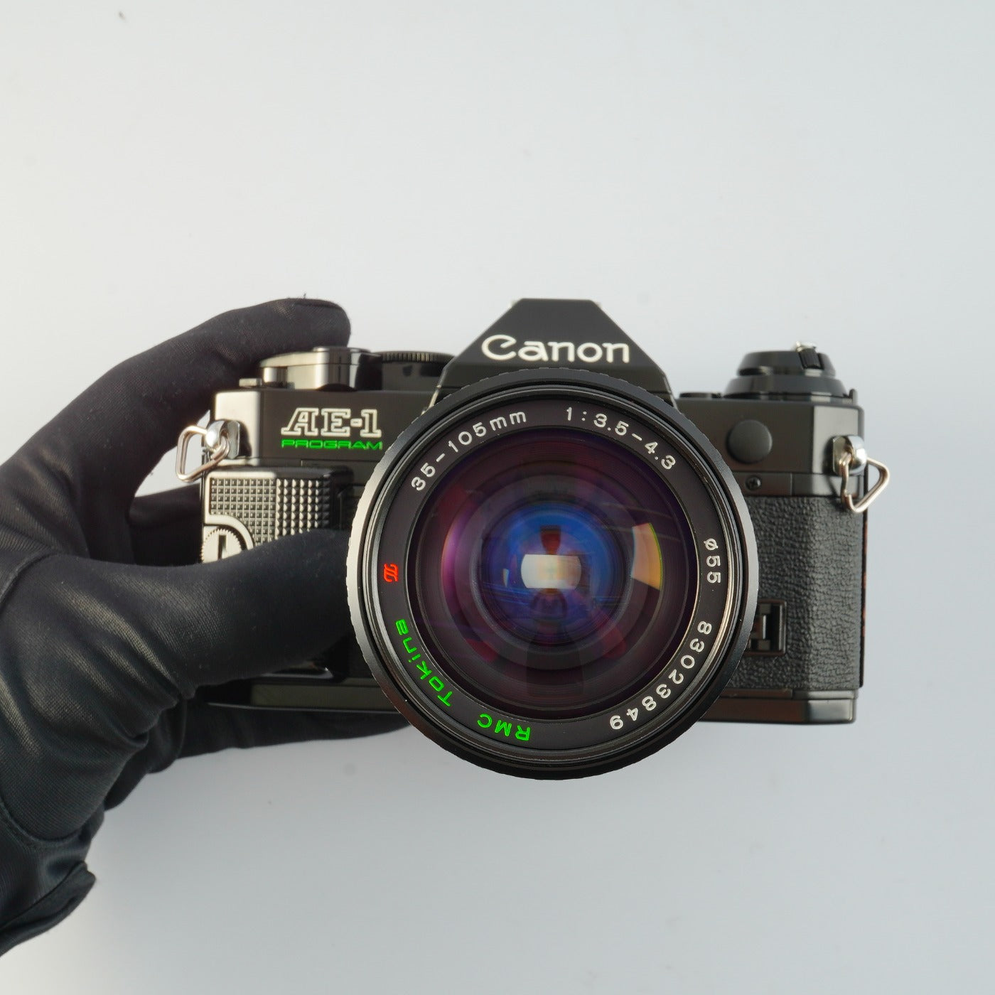【Serviced】 Canon AE-1 Program Black + RMC Tokina 35-105mm F/3.5-4.3 MF フィルム一眼レフカメラ