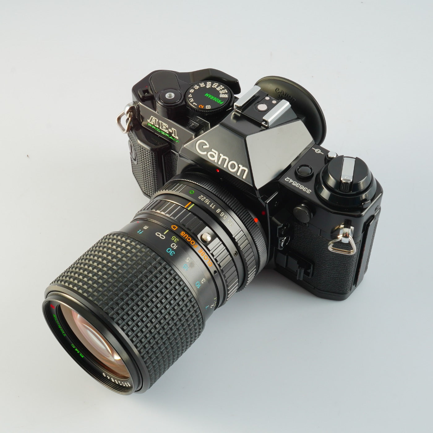 【Serviced】 Canon AE-1 Program Black + RMC Tokina 35-105mm F/3.5-4.3 MF フィルム一眼レフカメラ