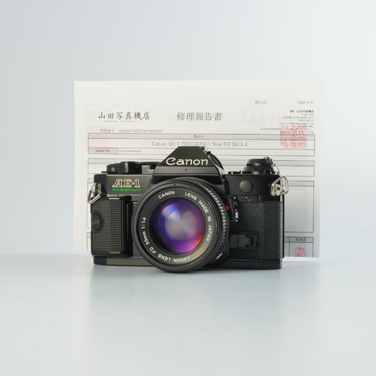 【Serviced】 Canon AE-1 Program Black + New FD 50mm F/1.4 MF フィルム一眼レフカメラ