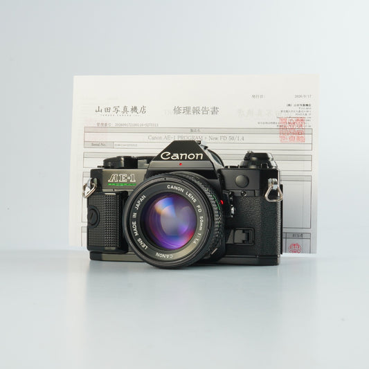 【Serviced】 Canon AE-1 Program Black + New FD 50mm F/1.4 MF フィルム一眼レフカメラ