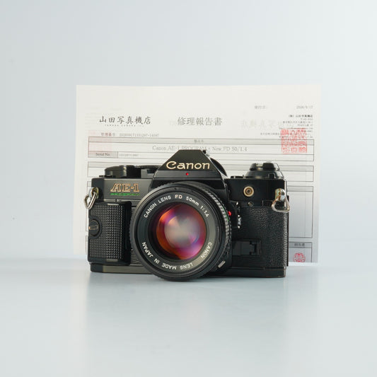 【Serviced】 Canon AE-1 Program Black + New FD 50mm F/1.4 MF フィルム一眼レフカメラ